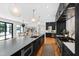 Modern kitchen with matte black island and cabinetry at 330 Tenney Circle, Chapel Hill, NC 27514