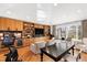 Spacious living room with custom built-ins, hardwood flooring, and an abundance of natural light at 330 Tenney Circle, Chapel Hill, NC 27514