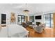 Inviting living room features a fireplace, high ceilings, and large windows for plenty of natural light at 330 Tenney Circle, Chapel Hill, NC 27514