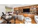 Bright living room with custom cabinetry, hardwood flooring, and many seating options at 330 Tenney Circle, Chapel Hill, NC 27514