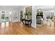 Elegant living room featuring hardwood floors, arched doorways, and designer decor, offering a stylish living space at 330 Tenney Circle, Chapel Hill, NC 27514