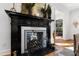 Living room features a fireplace with butterfly screen and classic mantle at 330 Tenney Circle, Chapel Hill, NC 27514