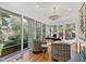 Bright office space with hardwood floors and backyard views through large windows at 330 Tenney Circle, Chapel Hill, NC 27514