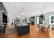 Bright open floor plan features a kitchen with an island and dining and living areas at 330 Tenney Circle, Chapel Hill, NC 27514