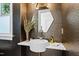 Stylish powder room with unique textured wall, modern fixtures, and elegant design at 330 Tenney Circle, Chapel Hill, NC 27514