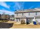 Backyard with an outdoor patio and a view of the neighboring townhome at 3931 Volkswalk Pl, Raleigh, NC 27610