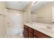 Neutral bathroom featuring double vanity, combination tub and shower, and updated fixtures at 3931 Volkswalk Pl, Raleigh, NC 27610