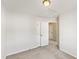 Spacious bedroom with neutral walls, carpet, and multiple closets for ample storage at 3931 Volkswalk Pl, Raleigh, NC 27610