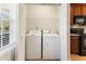 Conveniently located laundry room with modern washer and dryer units in a closet at 3931 Volkswalk Pl, Raleigh, NC 27610