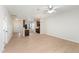 Bright and airy living room featuring wood flooring, and an open layout flowing into the adjacent kitchen area at 3931 Volkswalk Pl, Raleigh, NC 27610