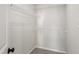 Spacious walk-in closet with white wire shelving for organized storage in this lovely home at 3931 Volkswalk Pl, Raleigh, NC 27610