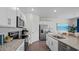 Modern kitchen with granite counters, stainless steel appliances and ample storage space at 415 Swift Creek Farm Ln, Clayton, NC 27520