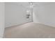 Bright carpeted bedroom with ceiling fan and a window at 4207 Hampstead Village Dr, Durham, NC 27703