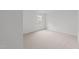 Bedroom with carpet and natural light from the window at 4207 Hampstead Village Dr, Durham, NC 27703