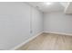 Spacious basement with painted walls and light wood floors, ready for customization at 427 Watson Rd, Efland, NC 27243