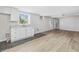 Spacious basement with laminate flooring, utility sink, and potential for many uses at 427 Watson Rd, Efland, NC 27243
