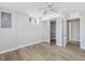 Basement bedroom with laminate flooring, closet and plenty of natural light through the egress window at 427 Watson Rd, Efland, NC 27243