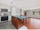 Stylish kitchen showcasing an island with a unique countertop and stainless appliances at 427 Watson Rd, Efland, NC 27243