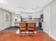 Modern kitchen featuring a center island with bar stools and ample counter space at 427 Watson Rd, Efland, NC 27243
