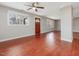 Spacious living room with hardwood floors, gray walls, and natural light at 427 Watson Rd, Efland, NC 27243