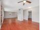 Open living area featuring hardwood floors, gray walls, and recessed lighting at 427 Watson Rd, Efland, NC 27243