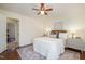 Inviting bedroom featuring stylish decor and a ceiling fan at 4705 Blue Bird Ct # C, Raleigh, NC 27606