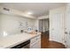 Bright kitchen featuring a dining area, modern appliances, and sleek countertops at 4705 Blue Bird Ct # C, Raleigh, NC 27606