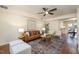 Inviting living room with hardwood floors, a ceiling fan, and comfortable seating at 4705 Blue Bird Ct # C, Raleigh, NC 27606