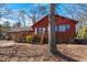 Back view of home featuring exterior deck with stairs leading to door of home at 6312 New Market Way, Raleigh, NC 27615