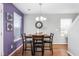 Cozy dining area with a wooden table, seating for four, and an adjacent wall that's two-toned at 642 Thistle Dr, Burlington, NC 27217