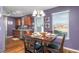 Cozy dining area with a wooden table, seating for four, and a charming chandelier at 642 Thistle Dr, Burlington, NC 27217