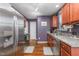 Modern kitchen features stainless steel appliances, granite countertops, and ample cabinet space at 642 Thistle Dr, Burlington, NC 27217