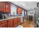 Charming kitchen with stainless appliances and dining area with hardwood floors at 642 Thistle Dr, Burlington, NC 27217