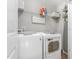 Well-organized laundry room with modern appliances and ample storage space at 642 Thistle Dr, Burlington, NC 27217