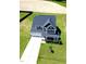 Aerial view of the property showcasing the home's layout, spacious lawn, and location in a serene neighborhood at 6804 Arlington Oaks Trl, Raleigh, NC 27603