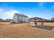 Large backyard with a gazebo, patio and home exterior at 6804 Arlington Oaks Trl, Raleigh, NC 27603