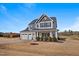 Charming two-story home boasts a well-manicured lawn and a two-car garage at 6804 Arlington Oaks Trl, Raleigh, NC 27603