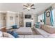 Elegant living room features a cozy fireplace, modern decor, and comfortable seating arrangements at 6804 Arlington Oaks Trl, Raleigh, NC 27603