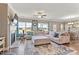 Large and comfortable living room with fireplace, plush seating, and plenty of natural light at 6804 Arlington Oaks Trl, Raleigh, NC 27603