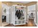 Convenient mudroom with built-in storage, coat hooks, and easy access to the kitchen at 6804 Arlington Oaks Trl, Raleigh, NC 27603