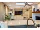 Bright open living space with a fireplace and custom built-in shelving and cabinets at 708 Kenmore Rd, Chapel Hill, NC 27514