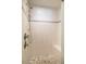 Shower with white marble tile, gray accent tile, gray stone floor, and a built-in seat at 708 Kenmore Rd, Chapel Hill, NC 27514