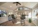 Inviting sunroom with tile floors, wainscotting, large windows, and outdoor views perfect for relaxing at 708 Kenmore Rd, Chapel Hill, NC 27514