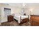 Serene bedroom featuring a comfortable bed, a neutral color palette, and plenty of natural light at 7925 Brown Bark Pl, Raleigh, NC 27615