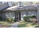 Charming single-story home with a well-manicured front yard and a welcoming entrance at 7925 Brown Bark Pl, Raleigh, NC 27615