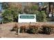 Yester Oaks community sign with lush landscaping at 7925 Brown Bark Pl, Raleigh, NC 27615