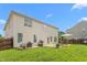 Large backyard with patio, outdoor dining, and landscaped yard at 80 Ingle View Ct, Burlington, NC 27215