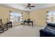 The bedroom has a desk and blue accents with natural light creating a bright and cheerful space at 80 Ingle View Ct, Burlington, NC 27215