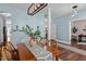 Stylish dining room featuring elegant hardwood floors and contemporary lighting for a modern touch at 80 Ingle View Ct, Burlington, NC 27215