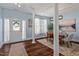 Inviting dining room with wainscoting, chandelier, and hardwood flooring, perfect for entertaining at 80 Ingle View Ct, Burlington, NC 27215